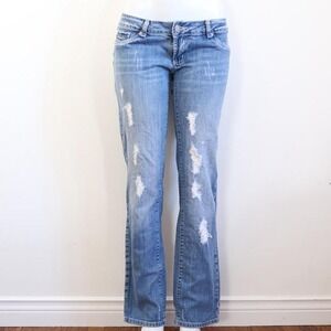 y2k low rise flare jeans light wash distressed denim raw hem